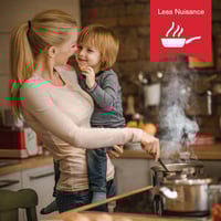 Mother and son are cooking in the kitchen, a less nuisance infographic in the foreground.